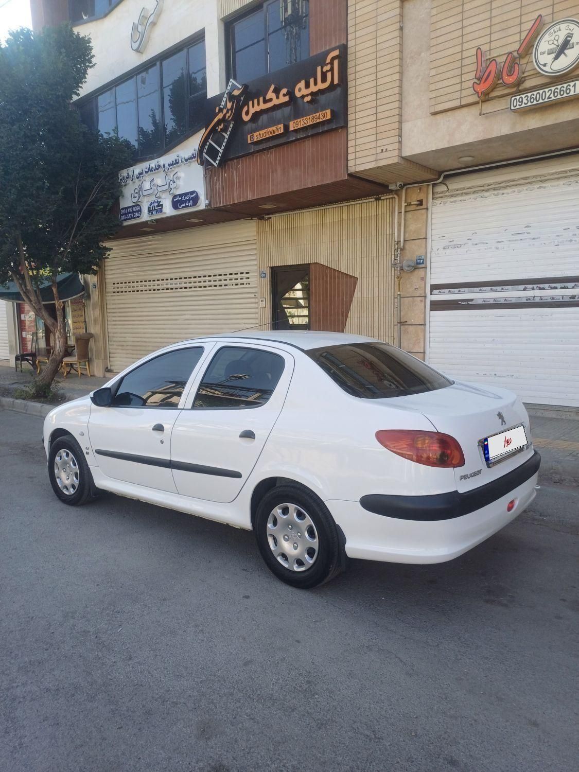 پژو ۲۰۶ صندوق دار v8 - 1393