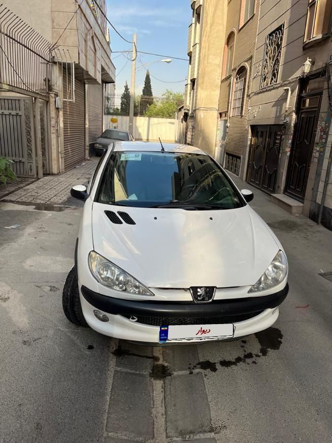 پژو ۲۰۶ صندوق دار v8 - 1391