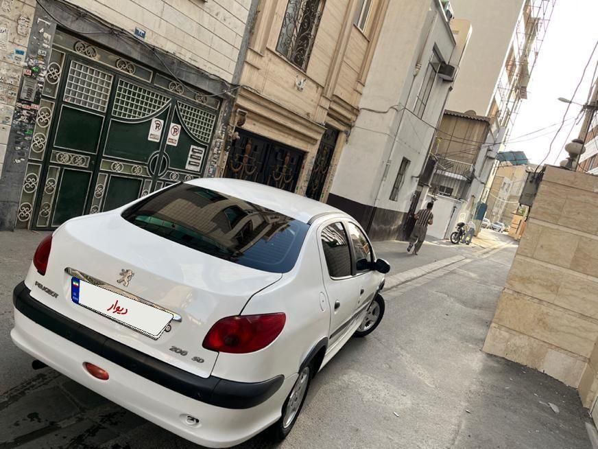 پژو ۲۰۶ صندوق دار v8 - 1391