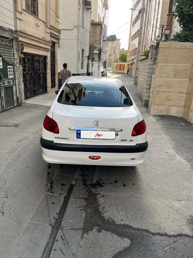 پژو ۲۰۶ صندوق دار v8 - 1391