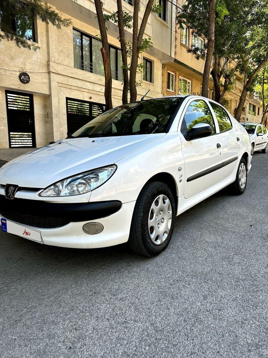پژو ۲۰۶ صندوق دار v8 - 1395