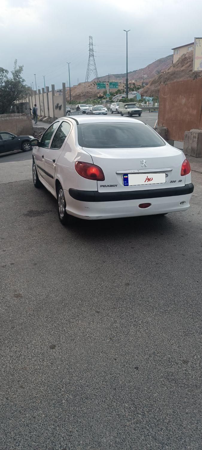 پژو ۲۰۶ صندوق دار v8 - 1394