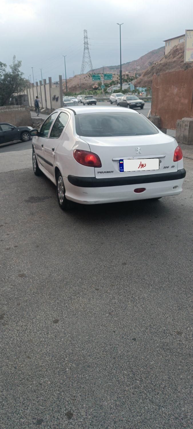 پژو ۲۰۶ صندوق دار v8 - 1394