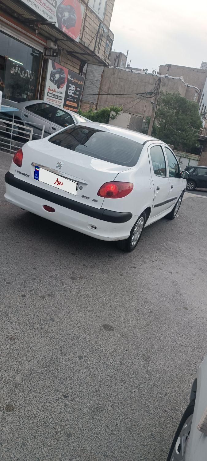 پژو ۲۰۶ صندوق دار v8 - 1394