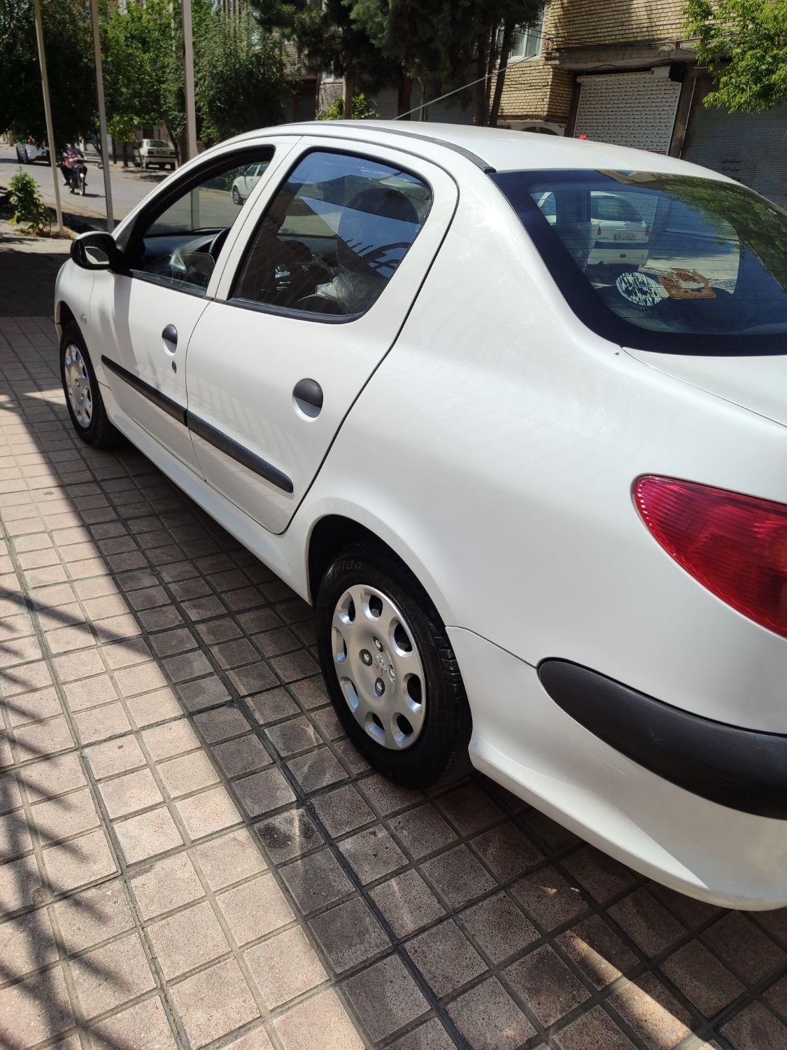 پژو ۲۰۶ صندوق دار v8 - 1398