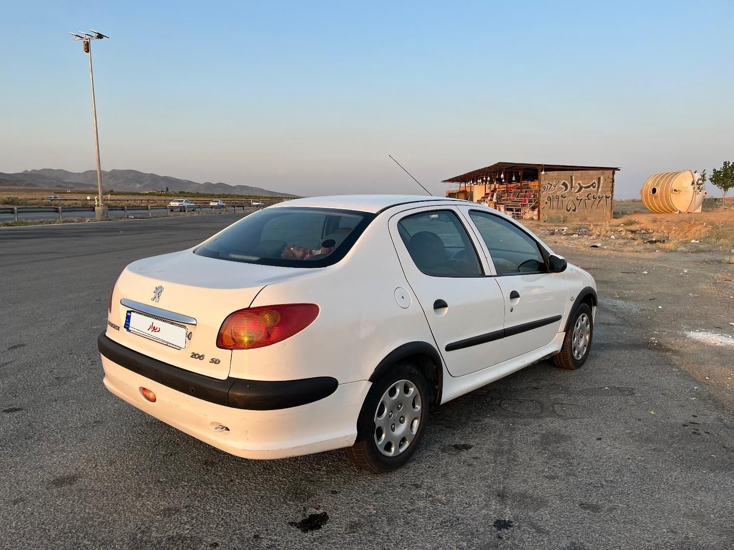 پژو ۲۰۶ صندوق دار v8 - 1393