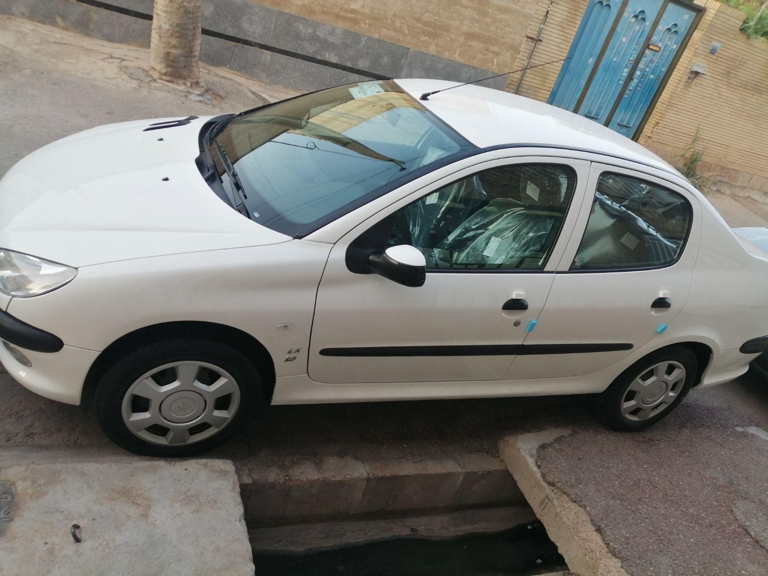 پژو ۲۰۶ صندوق دار v8 - 1396