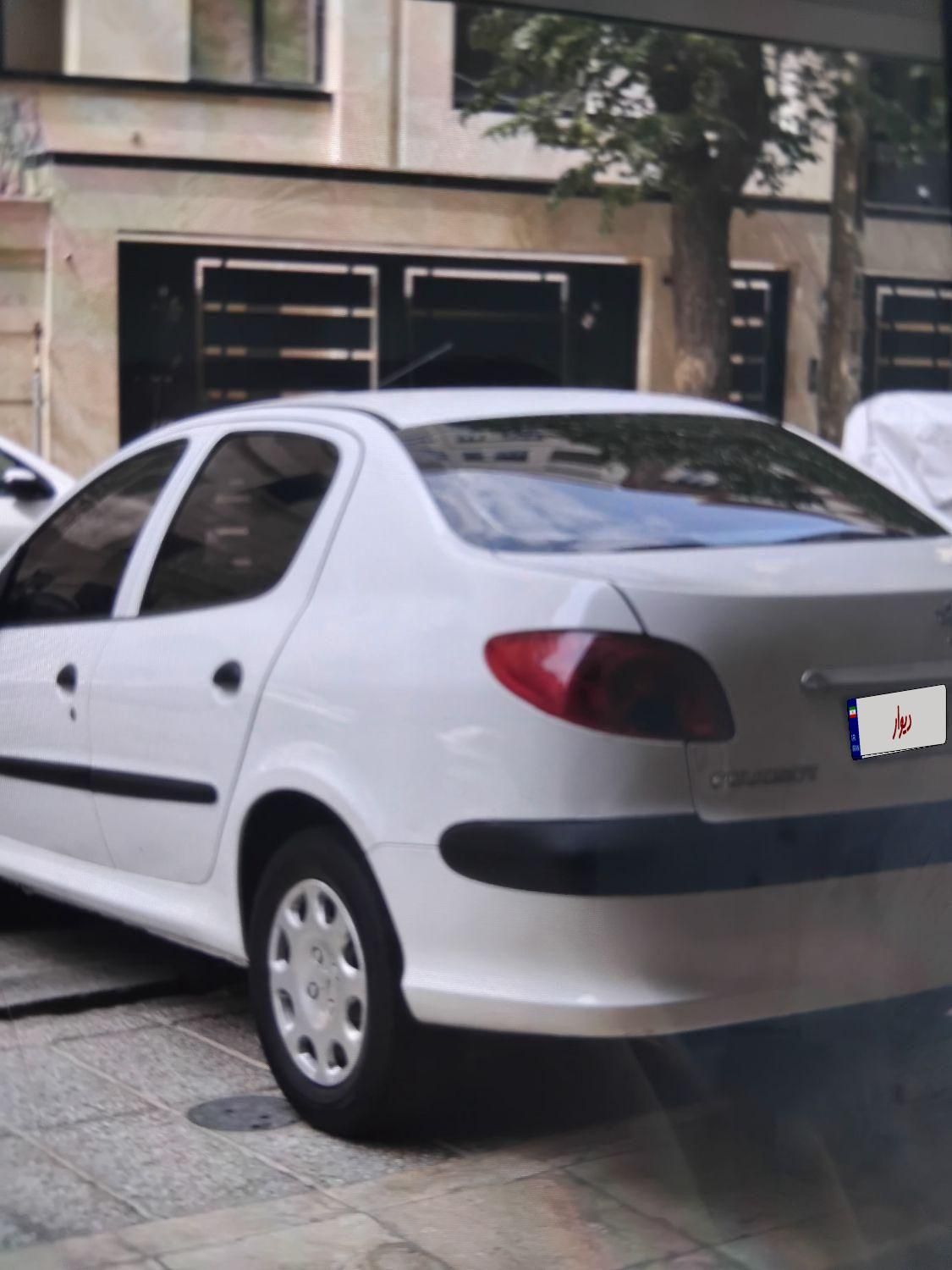 پژو ۲۰۶ صندوق دار v8 - 1394