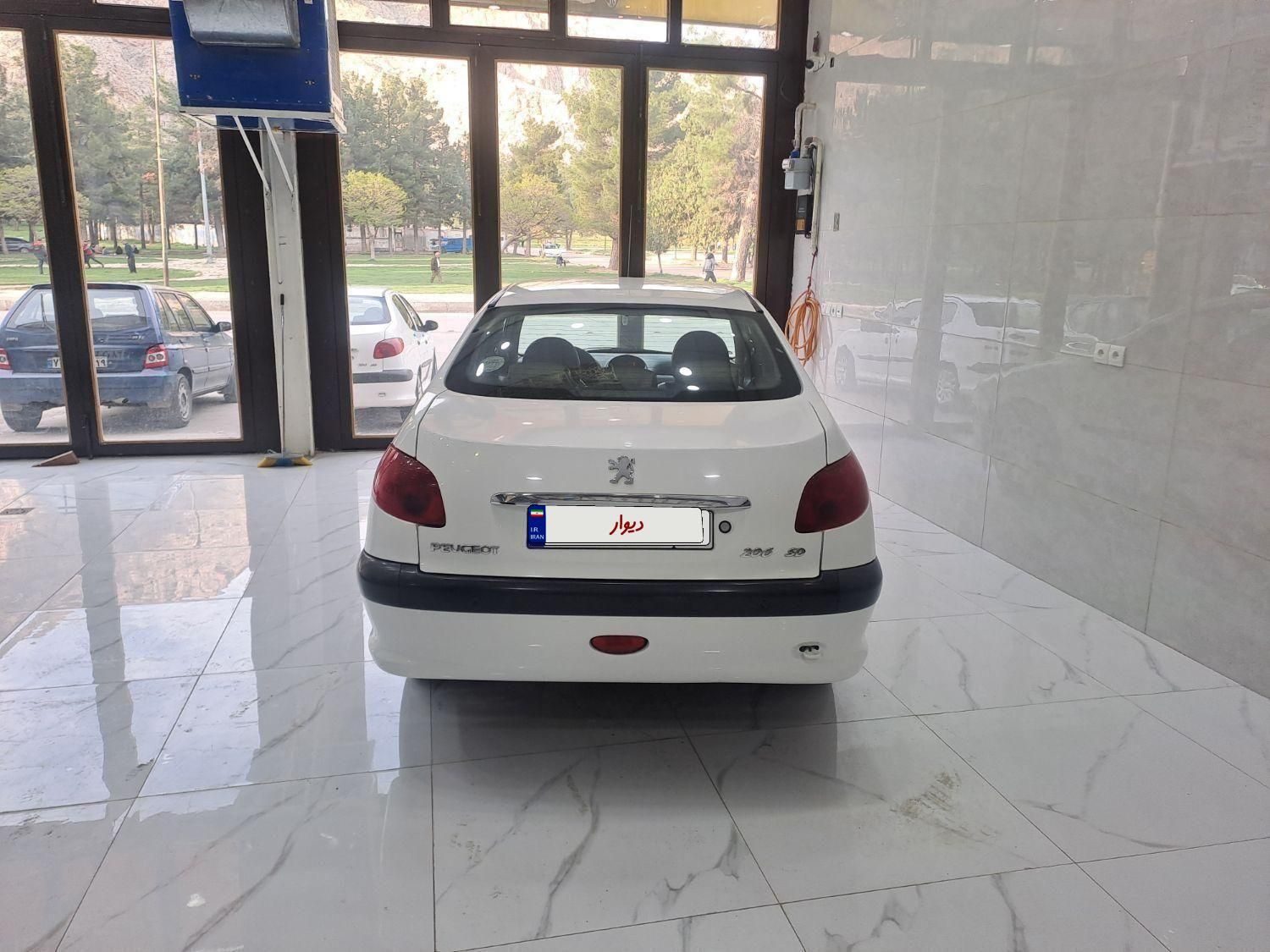 پژو ۲۰۶ صندوق دار v8 - 1397