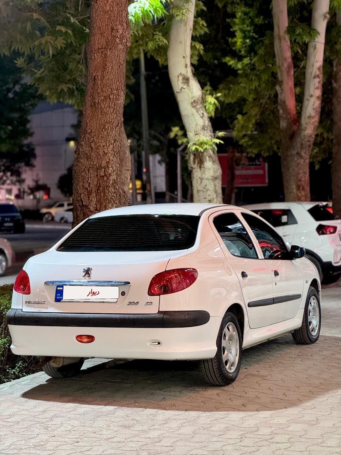 پژو ۲۰۶ صندوق دار v8 - 1394