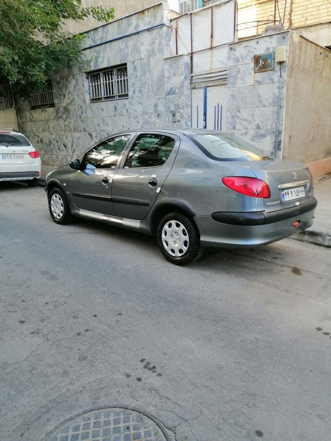 پژو ۲۰۶ صندوق دار v8 - 1394