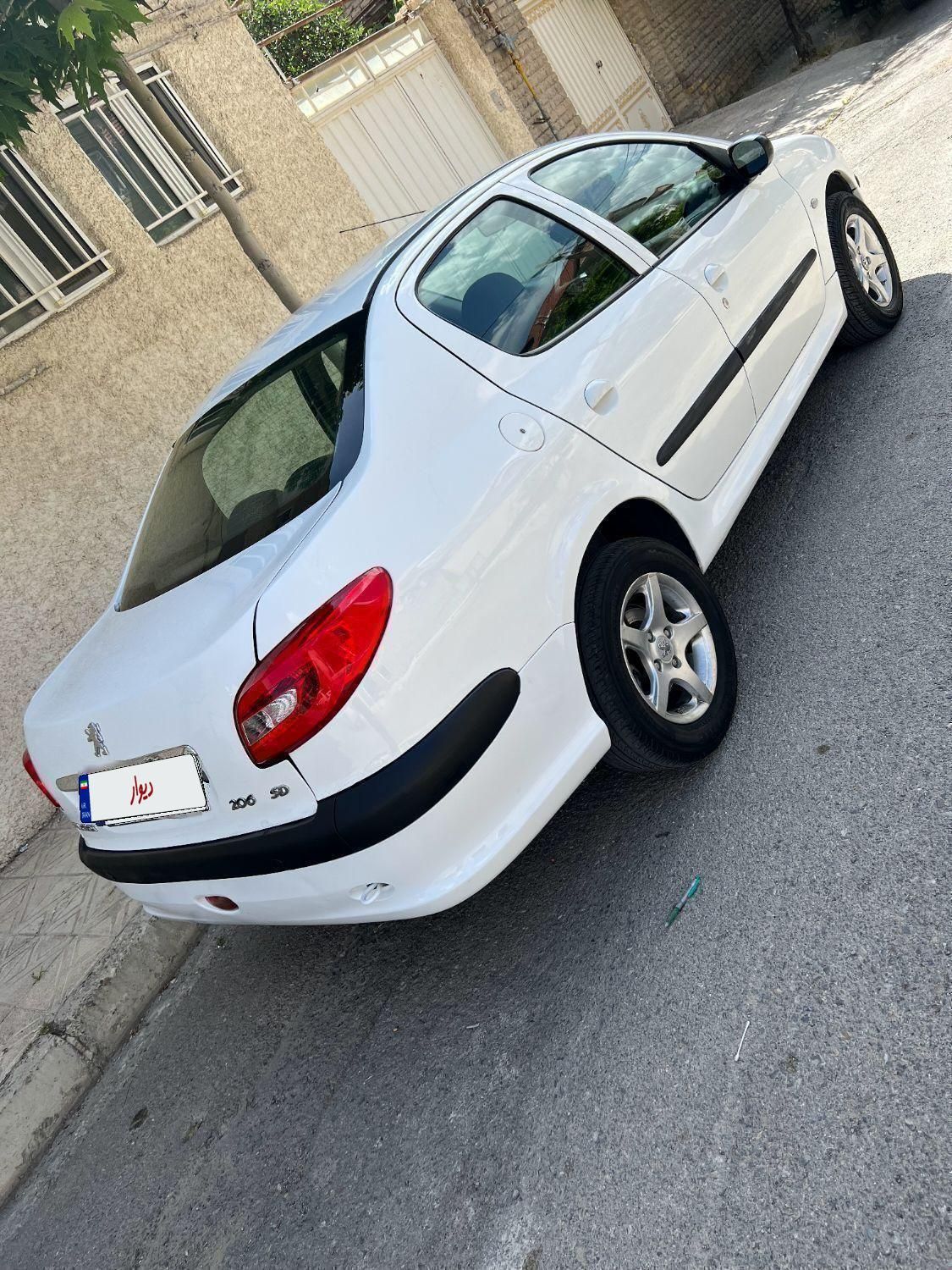 پژو ۲۰۶ صندوق دار v8 - 1393
