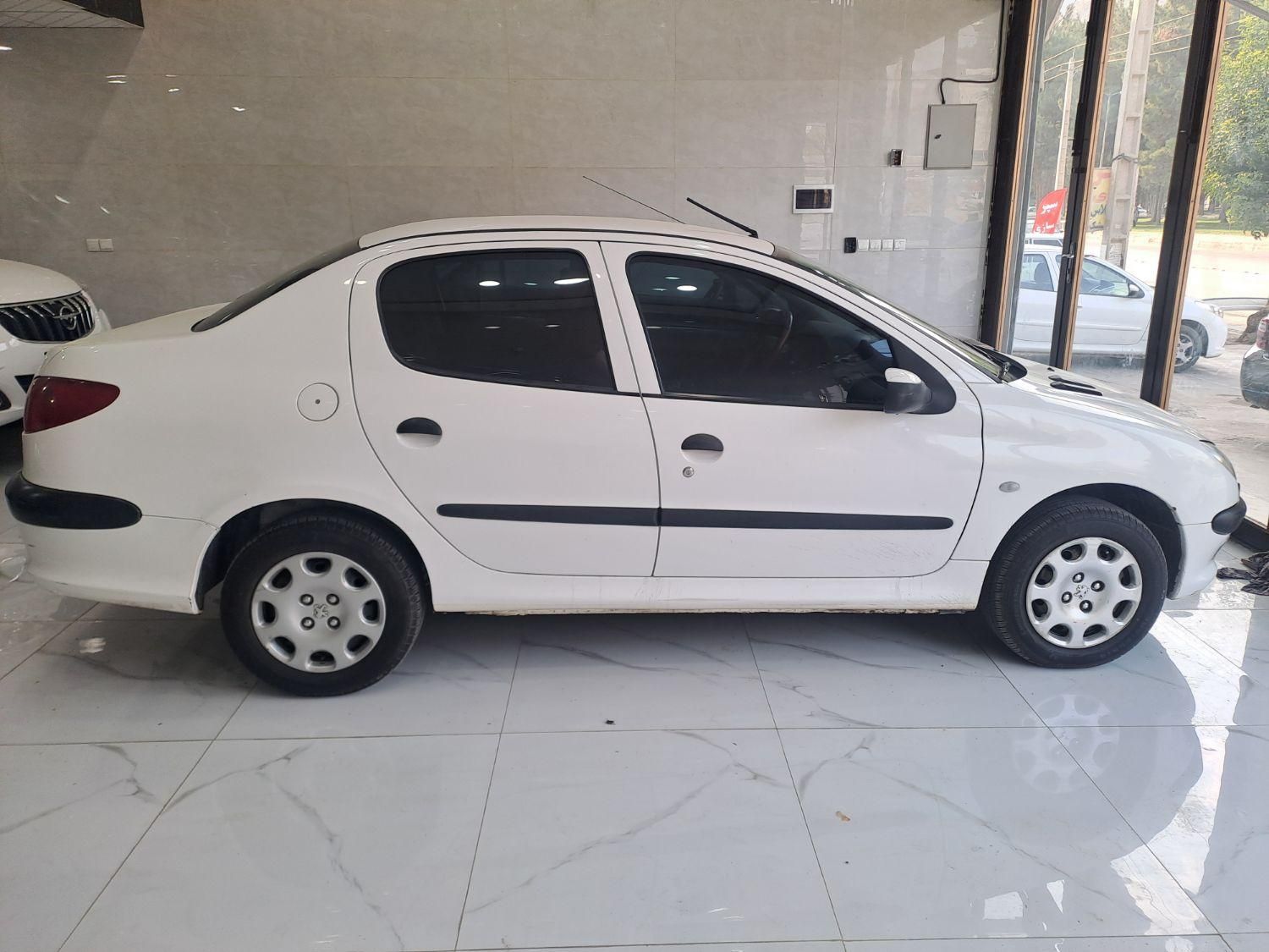 پژو ۲۰۶ صندوق دار v8 - 1398