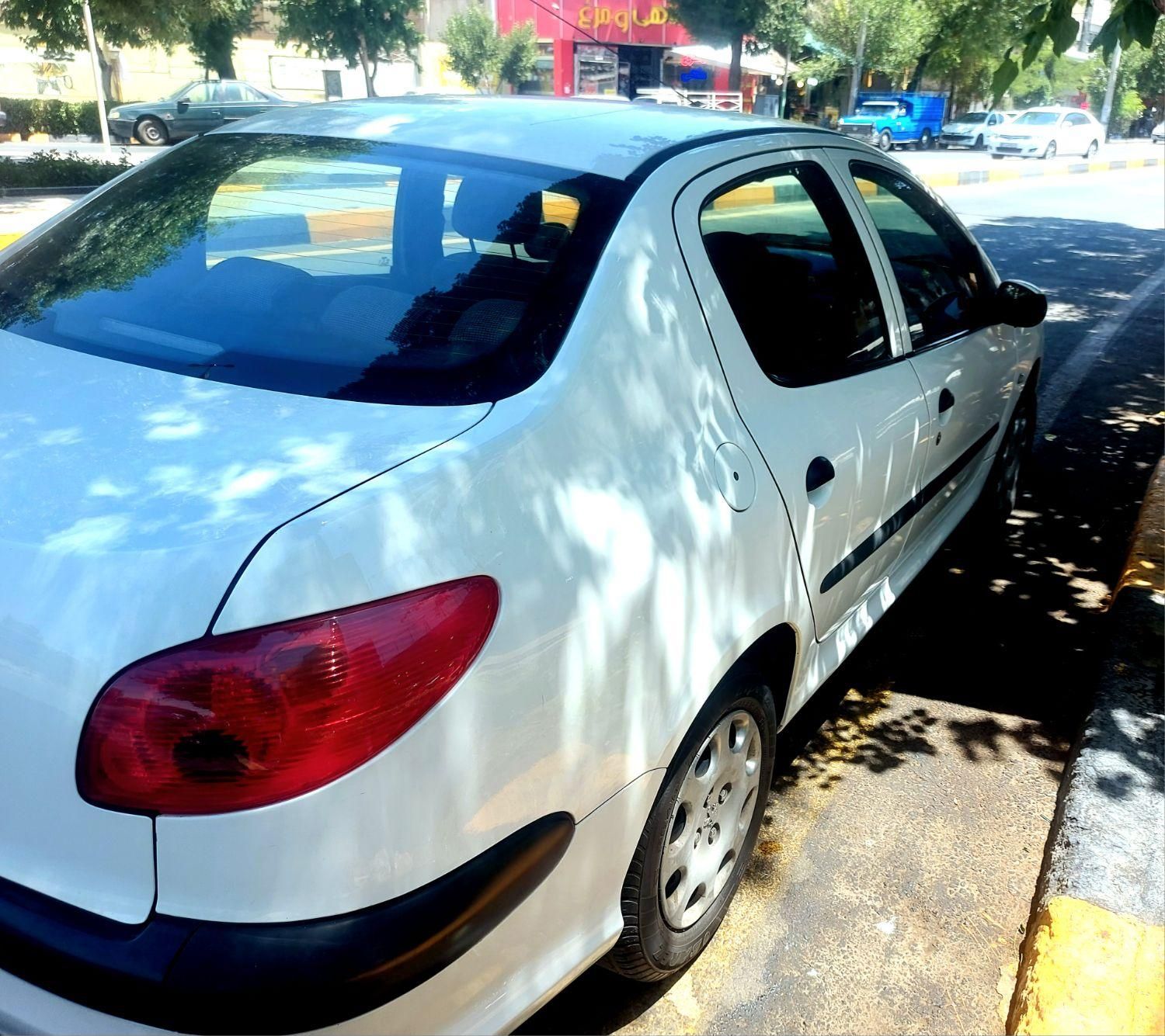 پژو ۲۰۶ صندوق دار v8 - 1395