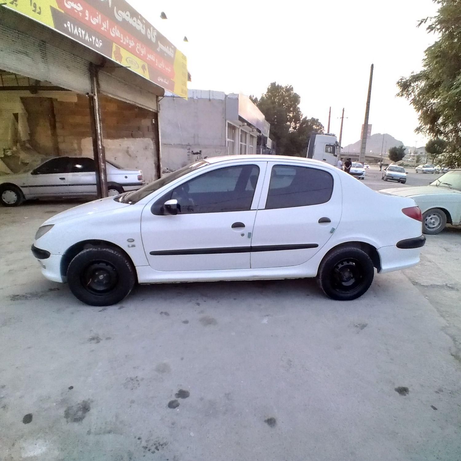 پژو ۲۰۶ صندوق دار v8 - 1396