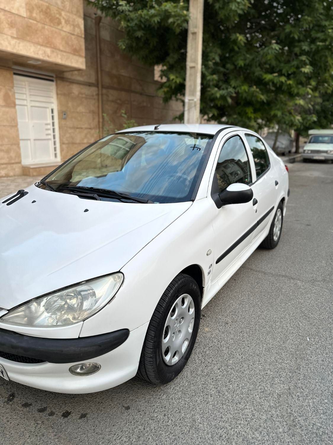 پژو ۲۰۶ صندوق دار v8 - 1396