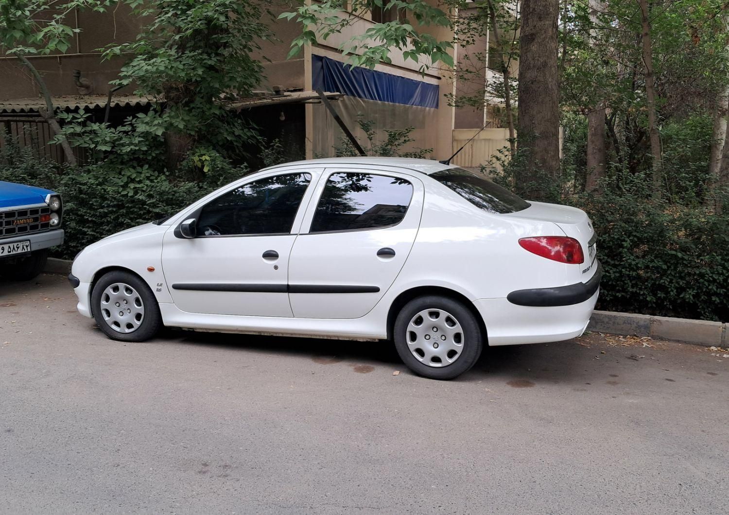 پژو ۲۰۶ صندوق دار v8 - 1396