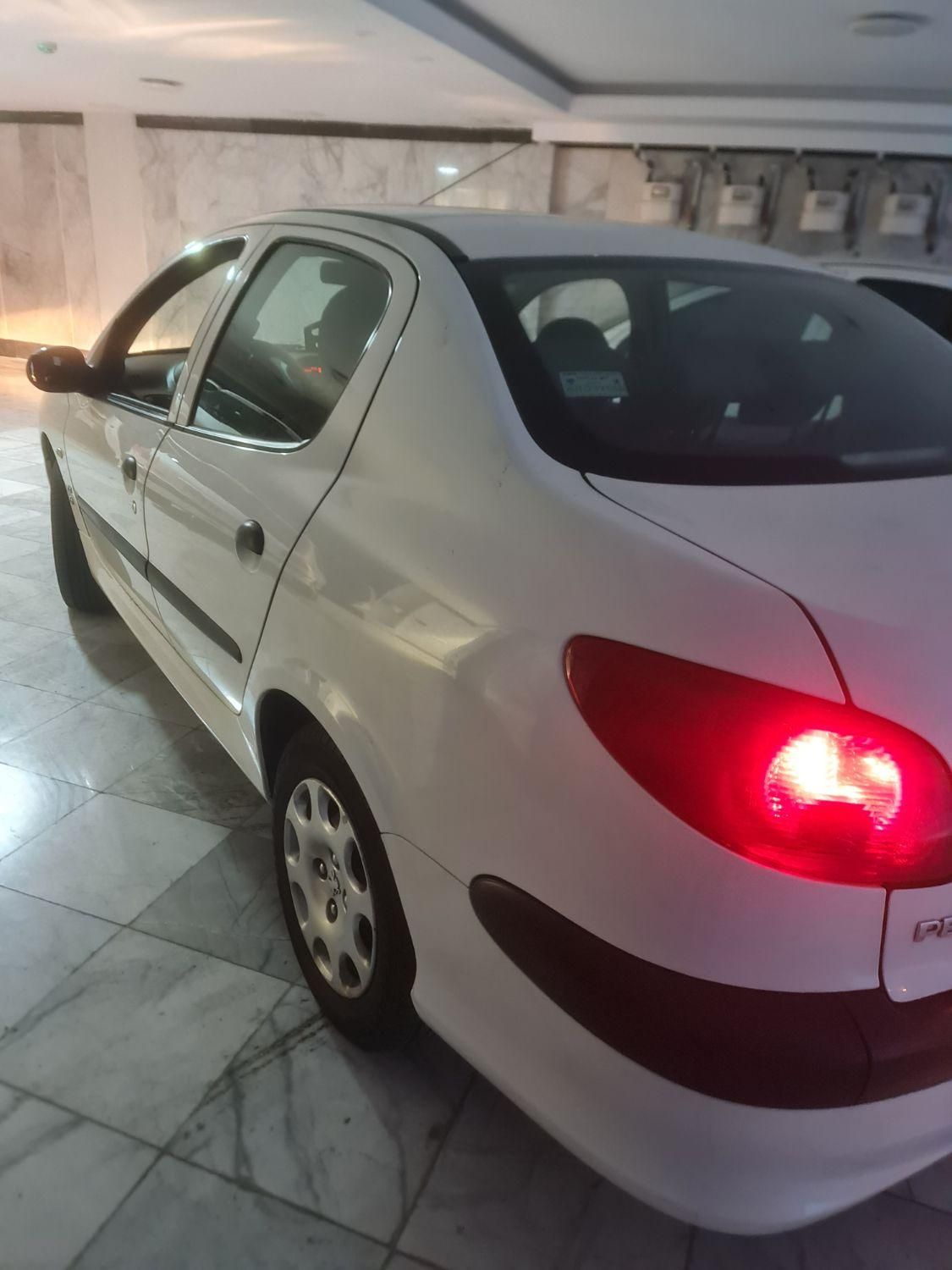 پژو ۲۰۶ صندوق دار v8 - 1396