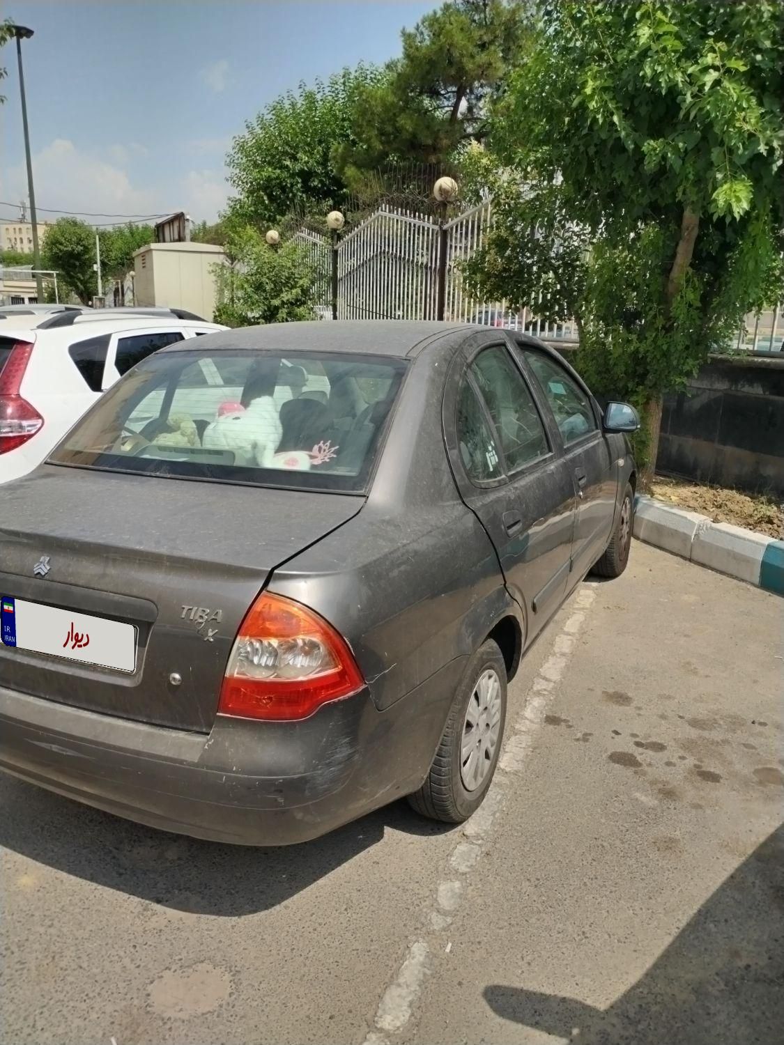 تیبا صندوق دار SX - 1392