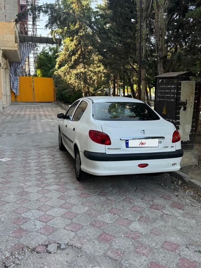 پژو ۲۰۶ صندوق دار v8 - 1396