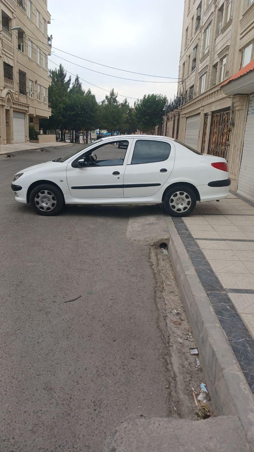 پژو ۲۰۶ صندوق دار v8 - 1396