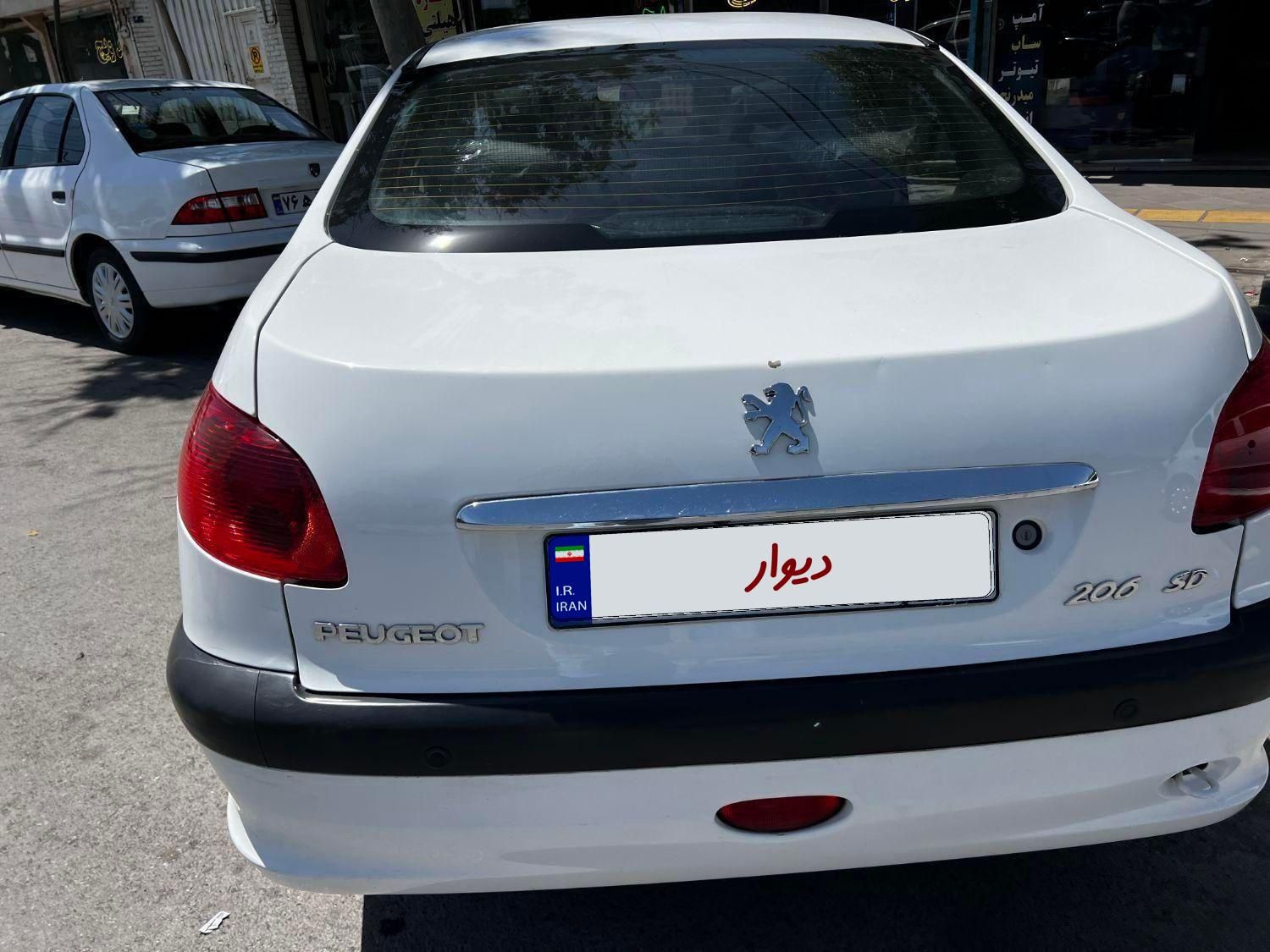 پژو ۲۰۶ صندوق دار v8 - 1396