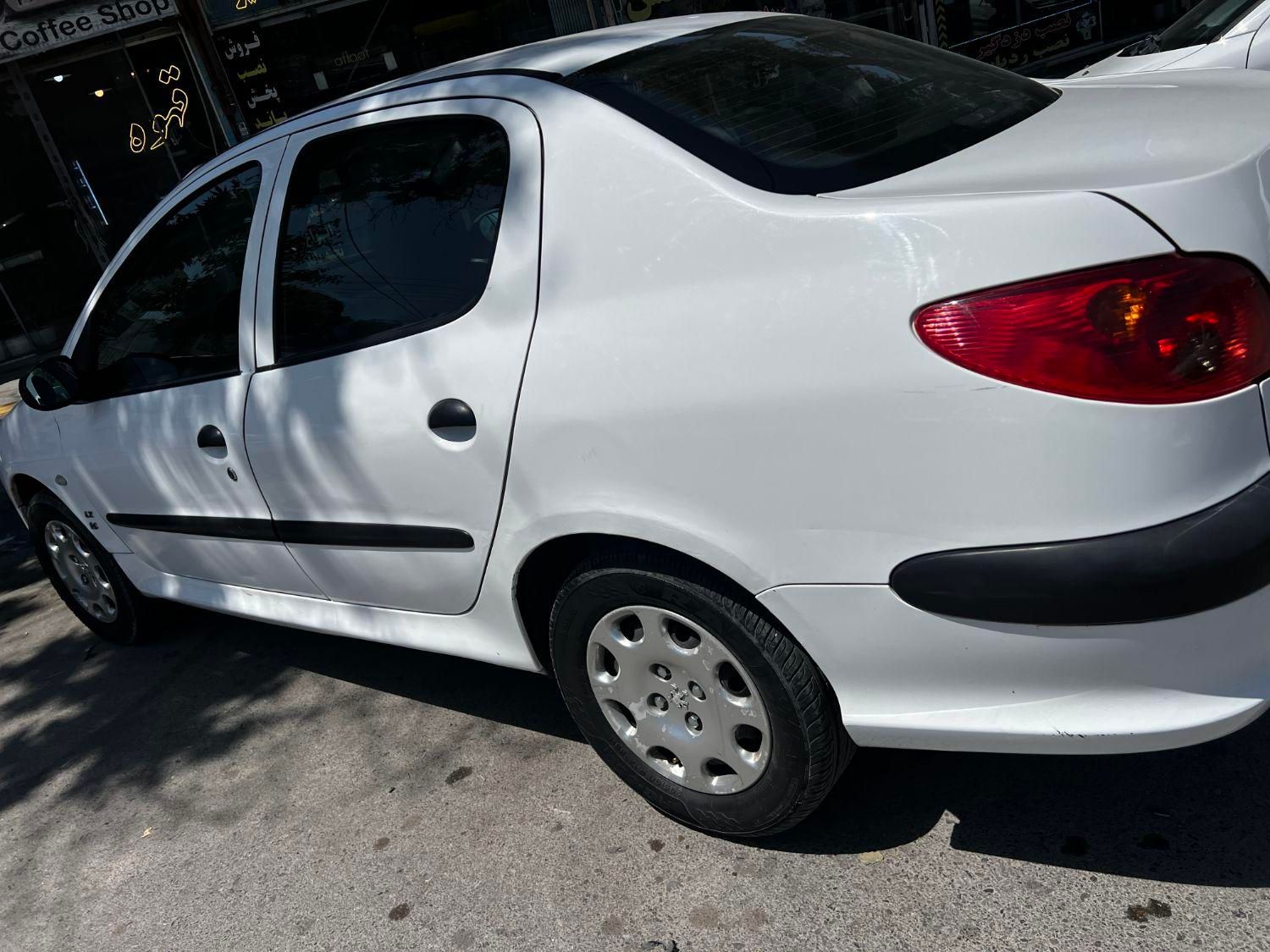 پژو ۲۰۶ صندوق دار v8 - 1396