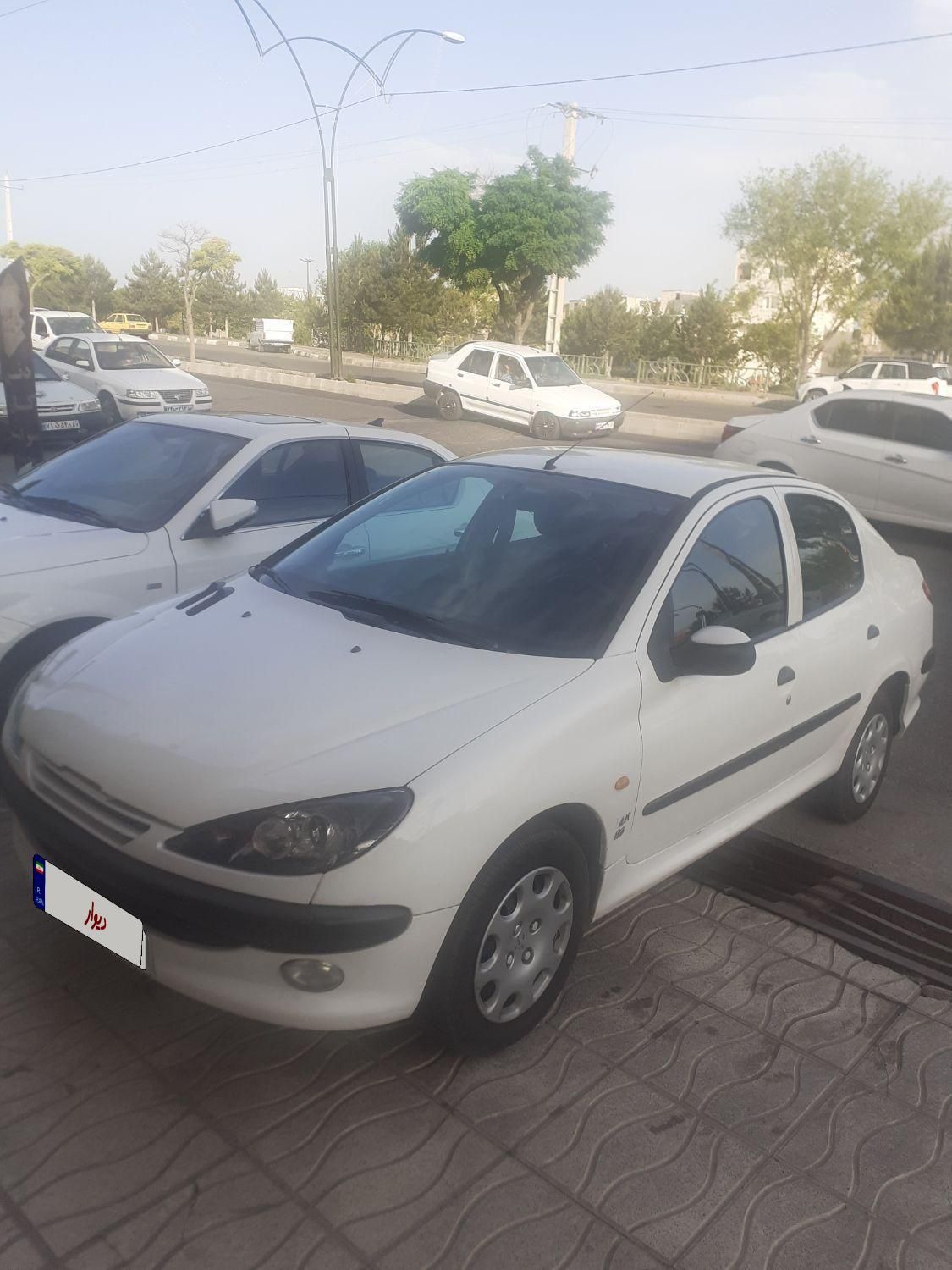 پژو ۲۰۶ صندوق دار v8 - 1394
