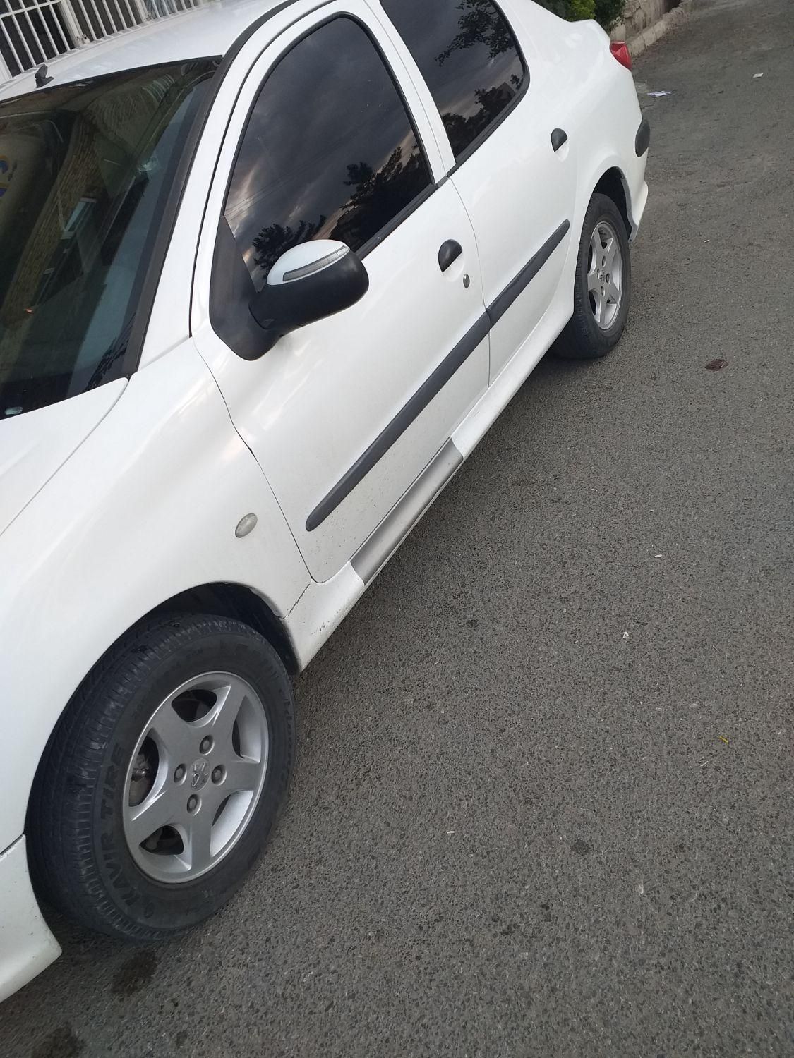 پژو ۲۰۶ صندوق دار v8 - 1395