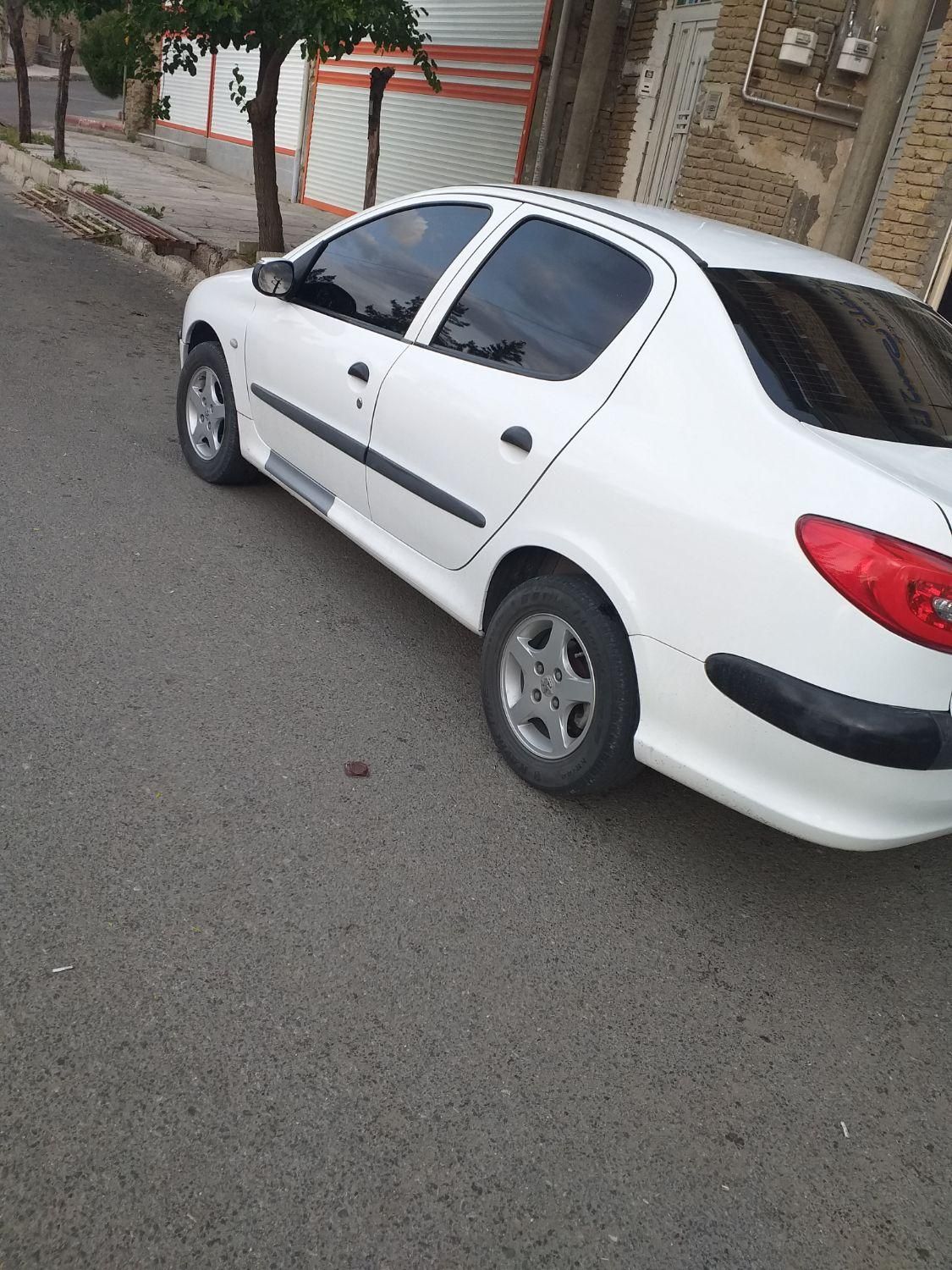 پژو ۲۰۶ صندوق دار v8 - 1395