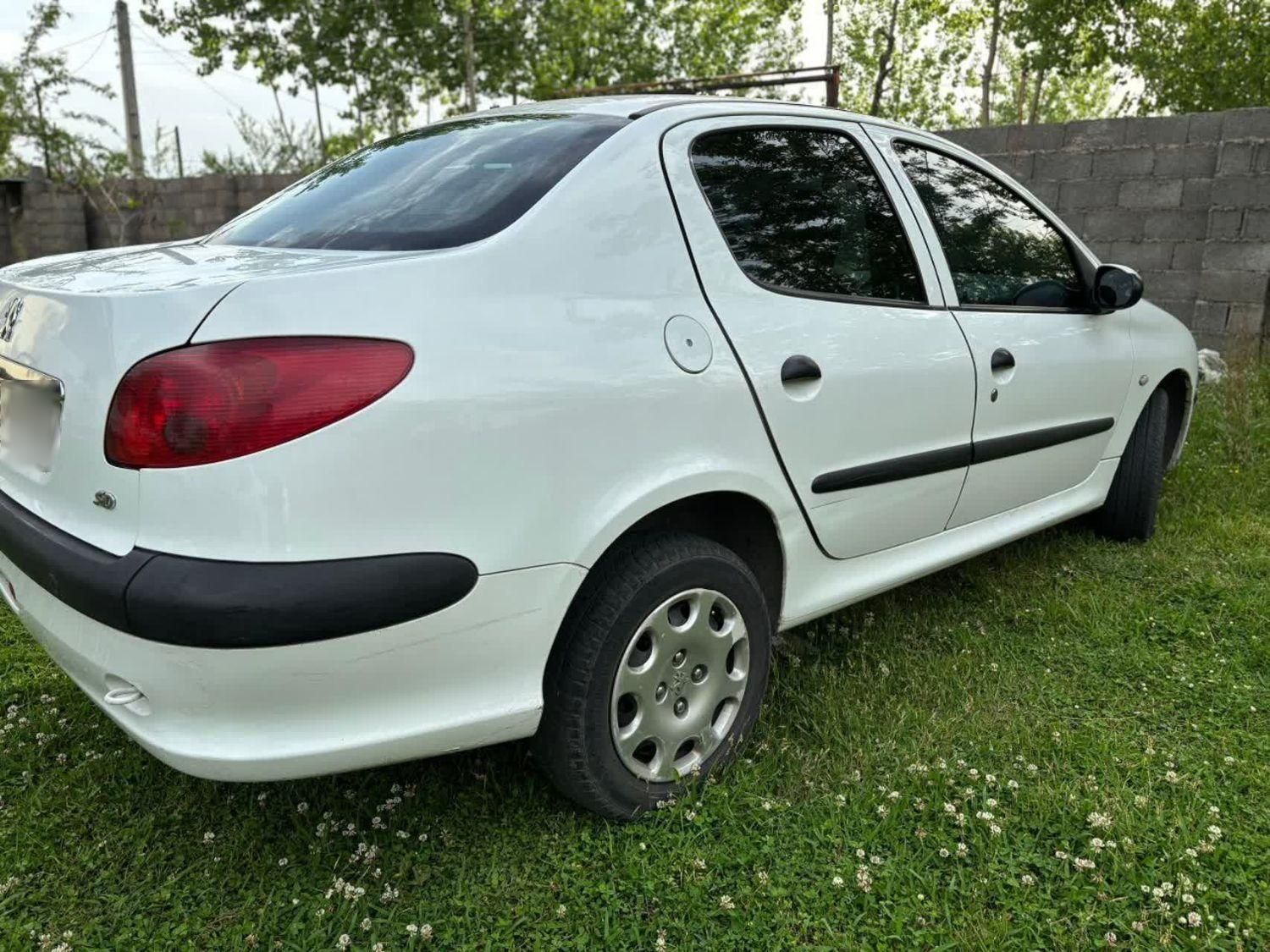 پژو ۲۰۶ صندوق دار v8 - 1396