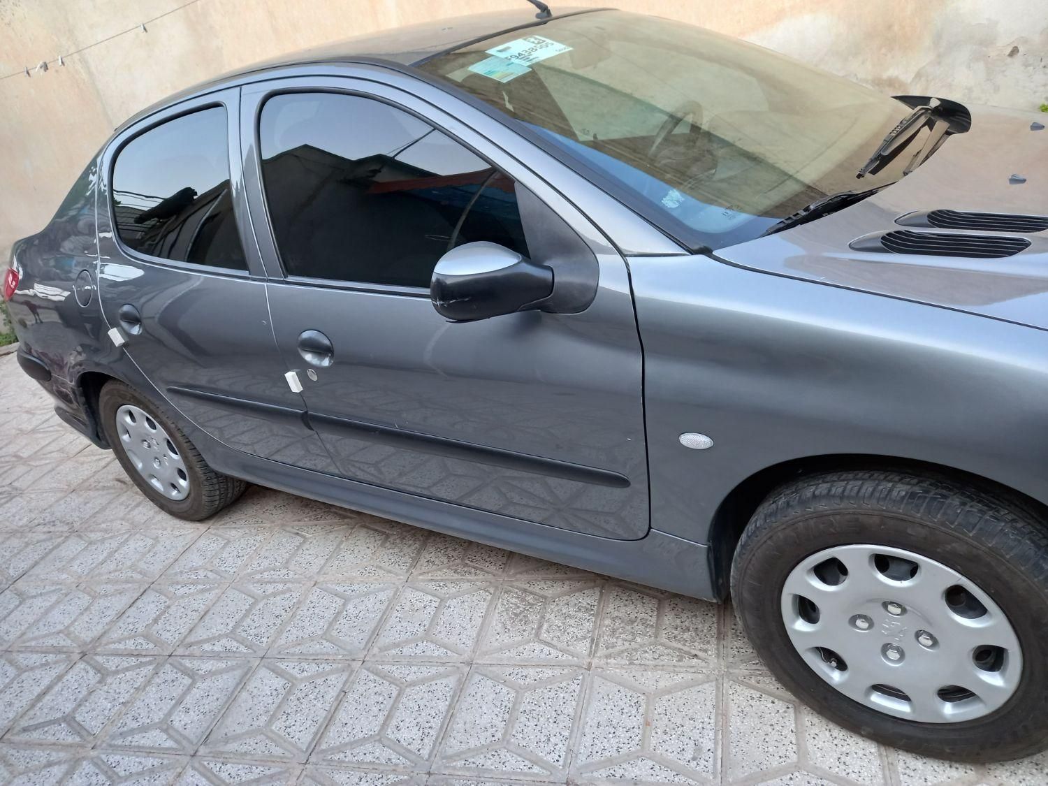 پژو ۲۰۶ صندوق دار v8 - 1391