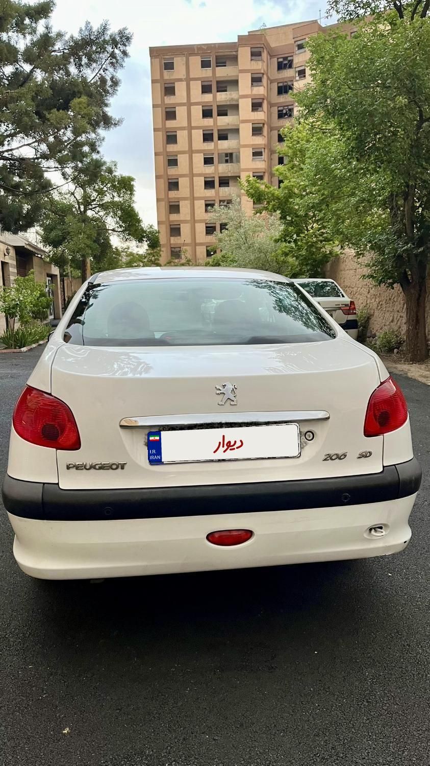 پژو ۲۰۶ صندوق دار v8 - 1394