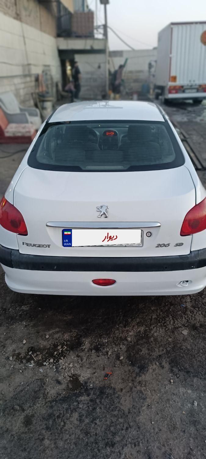 پژو ۲۰۶ صندوق دار v8 - 1396