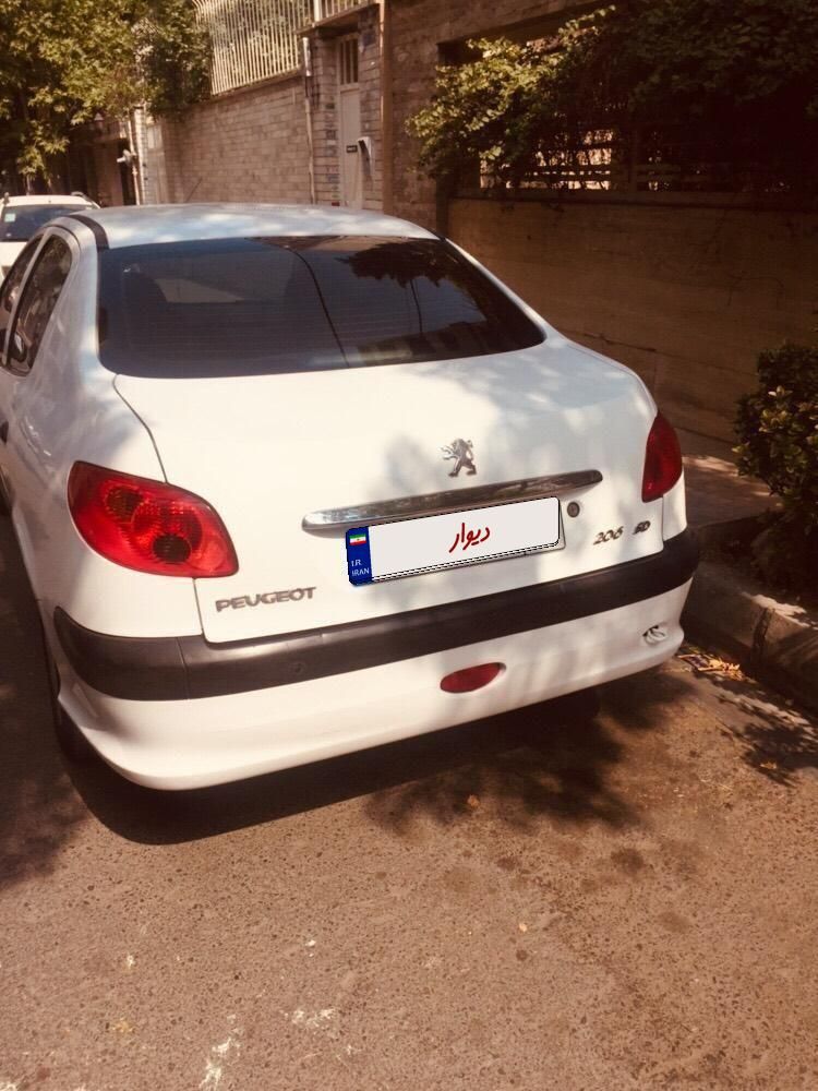 پژو ۲۰۶ صندوق دار v8 - 1392