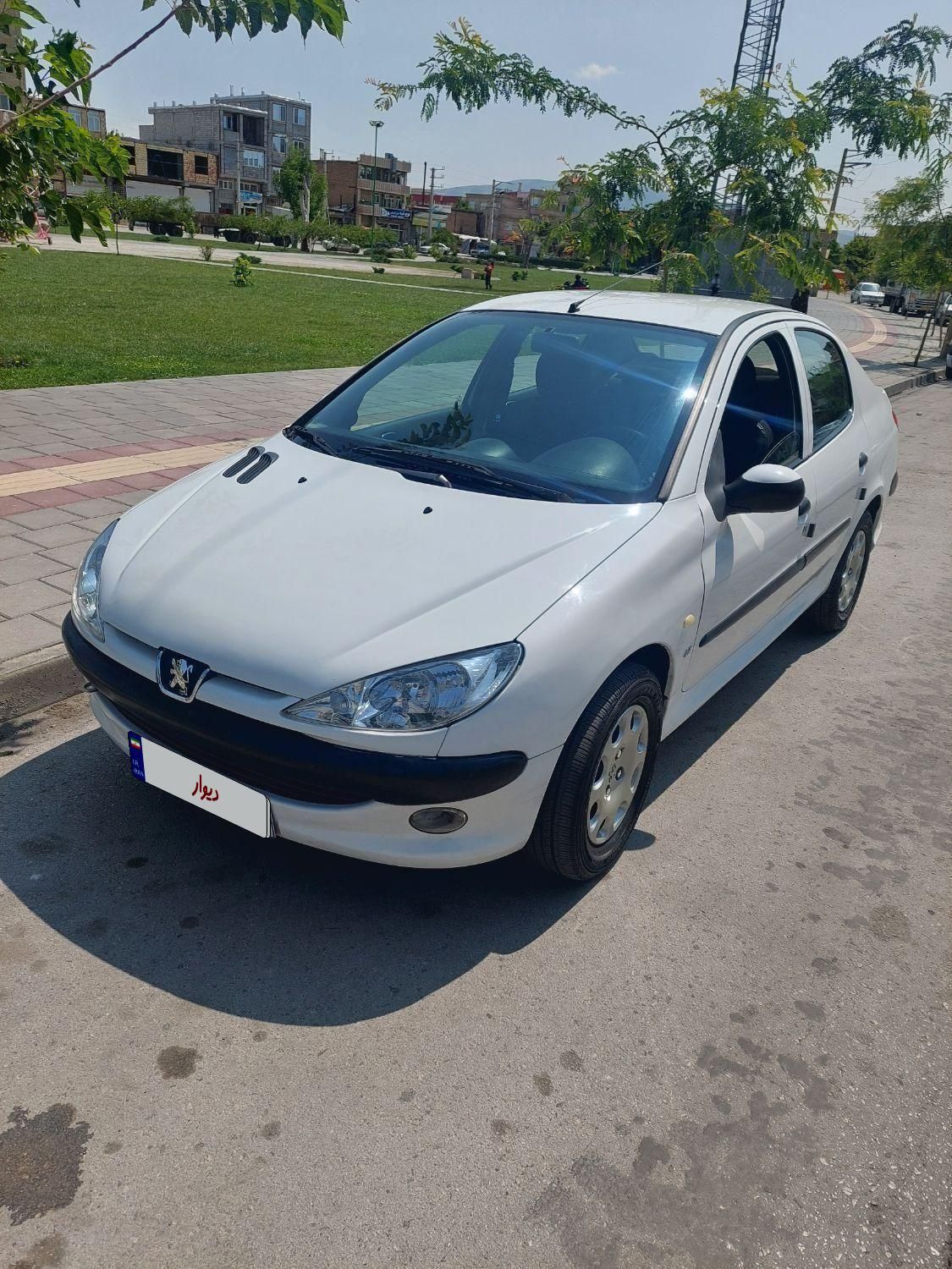 پژو ۲۰۶ صندوق دار v8 - 1395