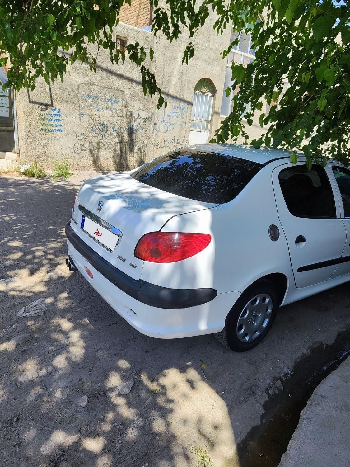 پژو ۲۰۶ صندوق دار v8 - 1396