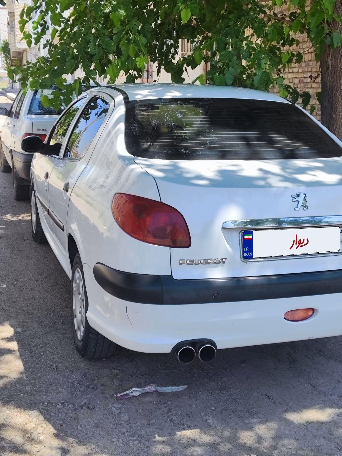 پژو ۲۰۶ صندوق دار v8 - 1396