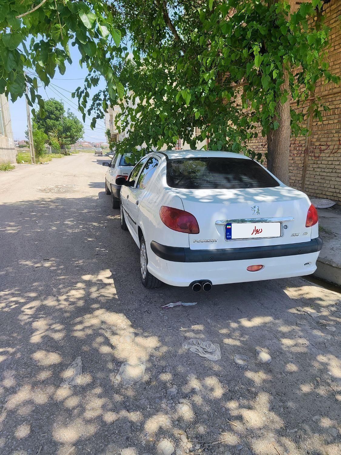 پژو ۲۰۶ صندوق دار v8 - 1396