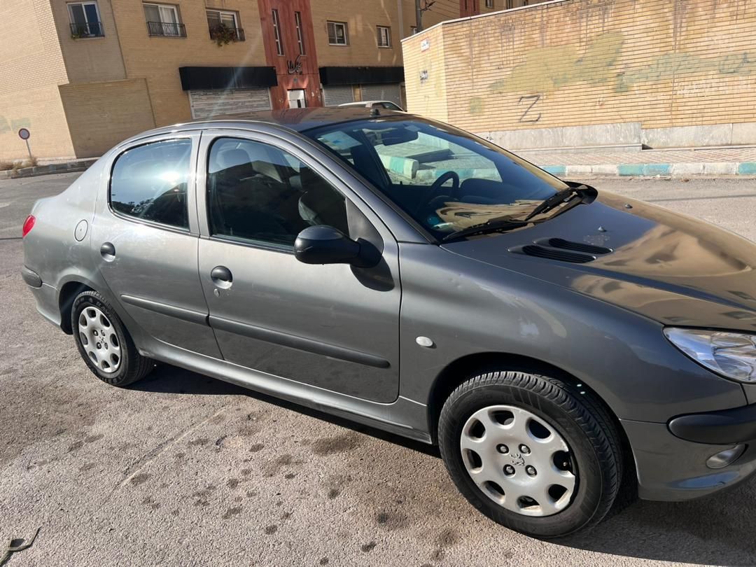 پژو ۲۰۶ صندوق دار v8 - 1394
