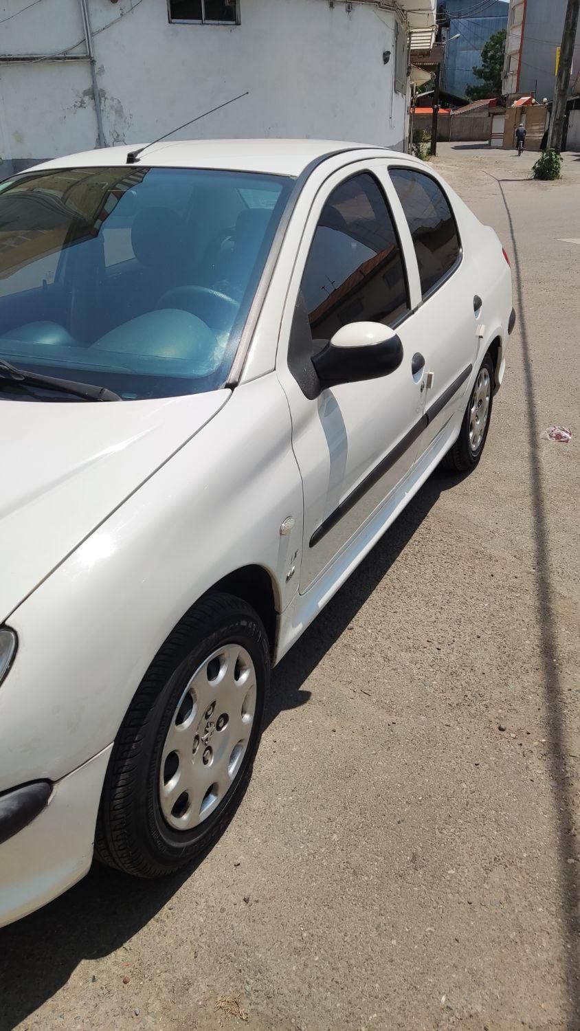 پژو ۲۰۶ صندوق دار v8 - 1395
