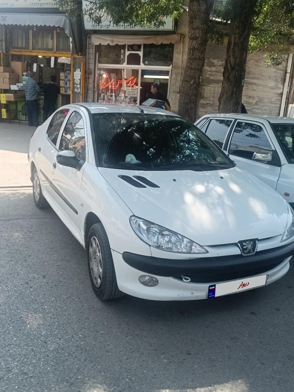 پژو ۲۰۶ صندوق دار v8 - 1393