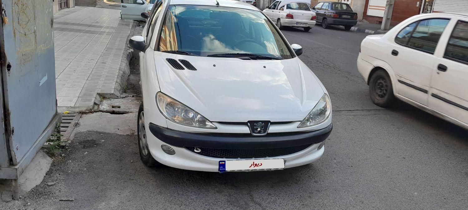 پژو ۲۰۶ صندوق دار v8 - 1391