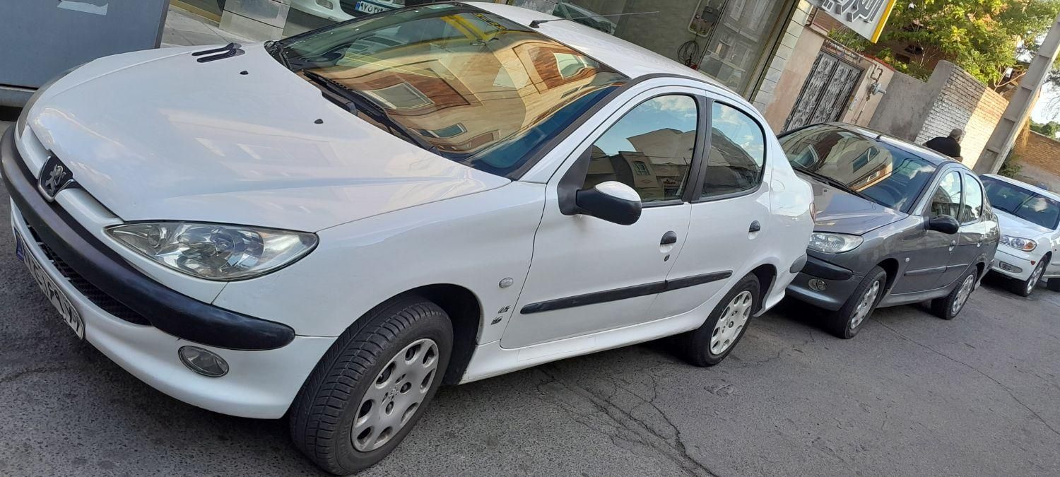 پژو ۲۰۶ صندوق دار v8 - 1391