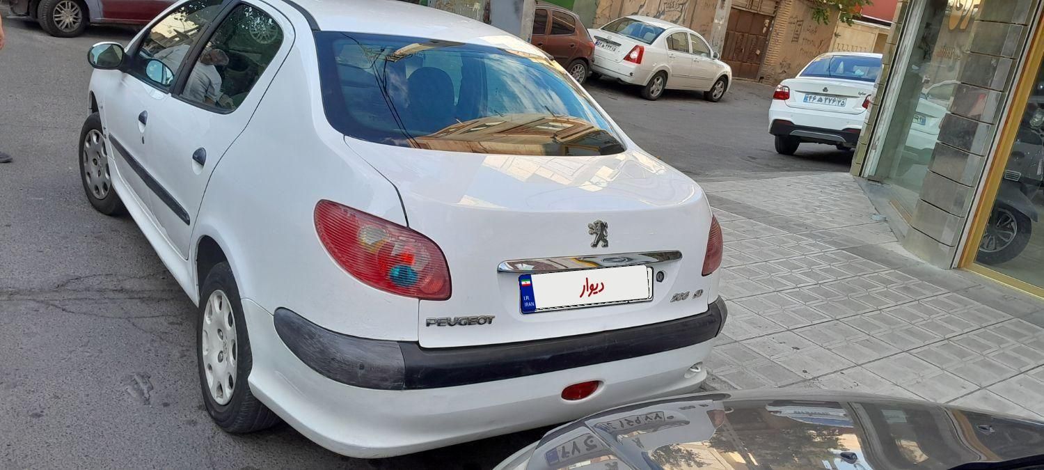 پژو ۲۰۶ صندوق دار v8 - 1391