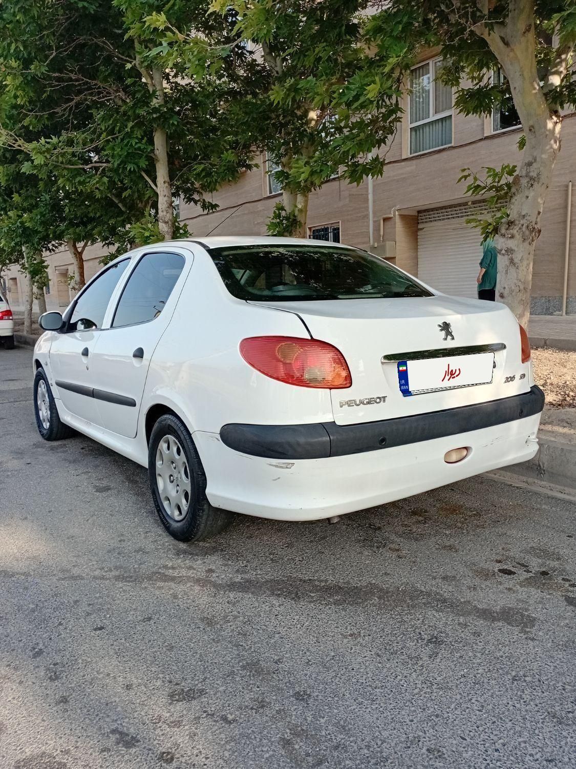 پژو ۲۰۶ صندوق دار v8 - 1394
