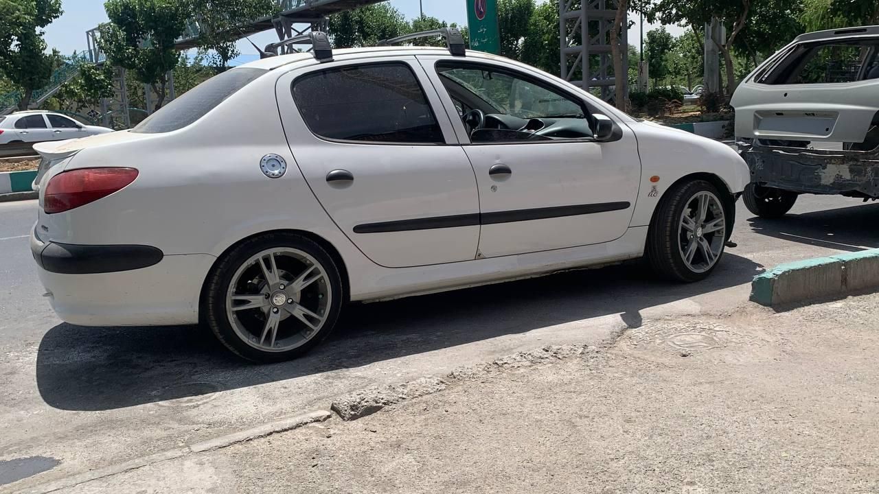 پژو ۲۰۶ صندوق دار v8 - 1394
