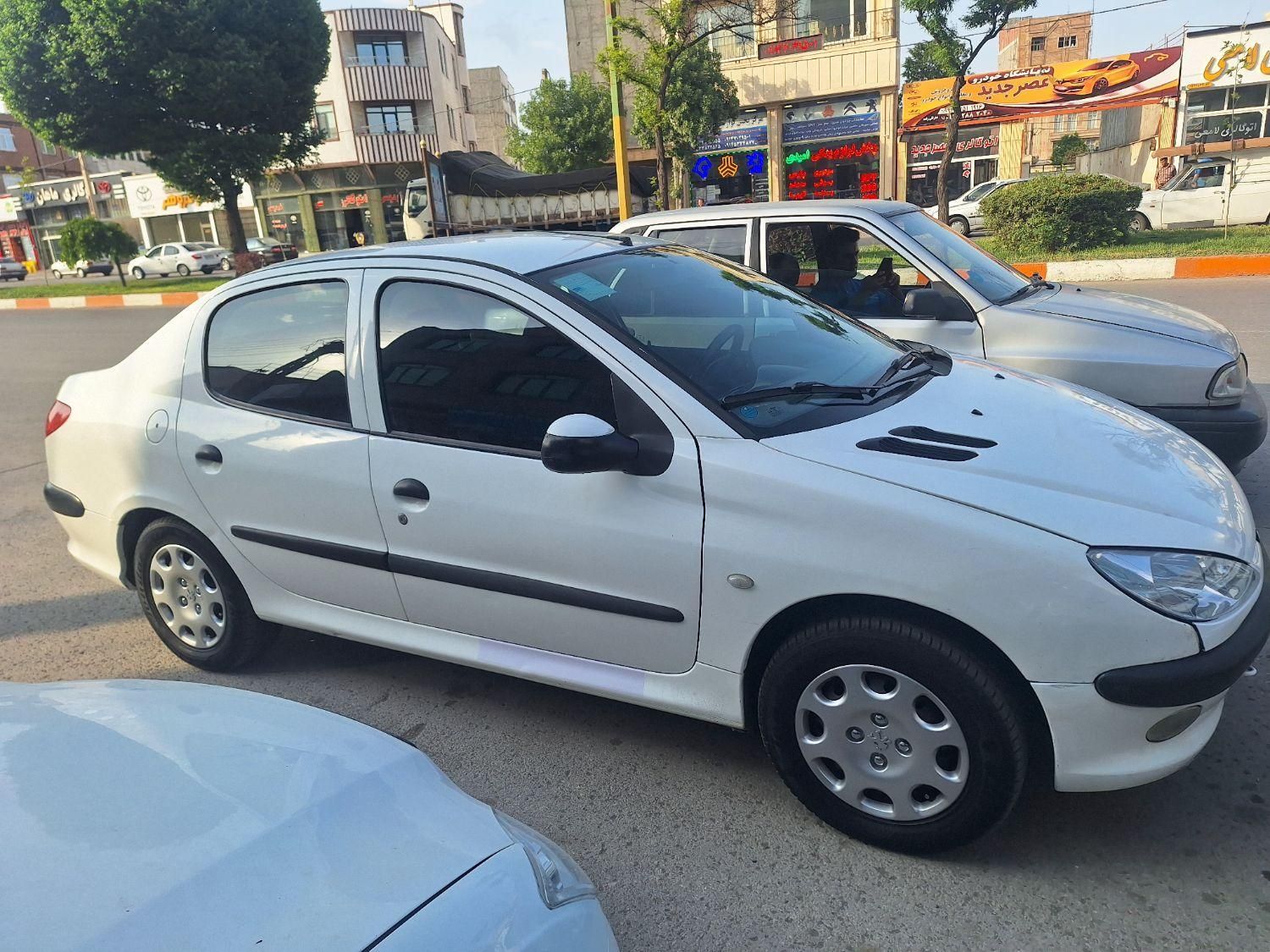 پژو ۲۰۶ صندوق دار v8 - 1396