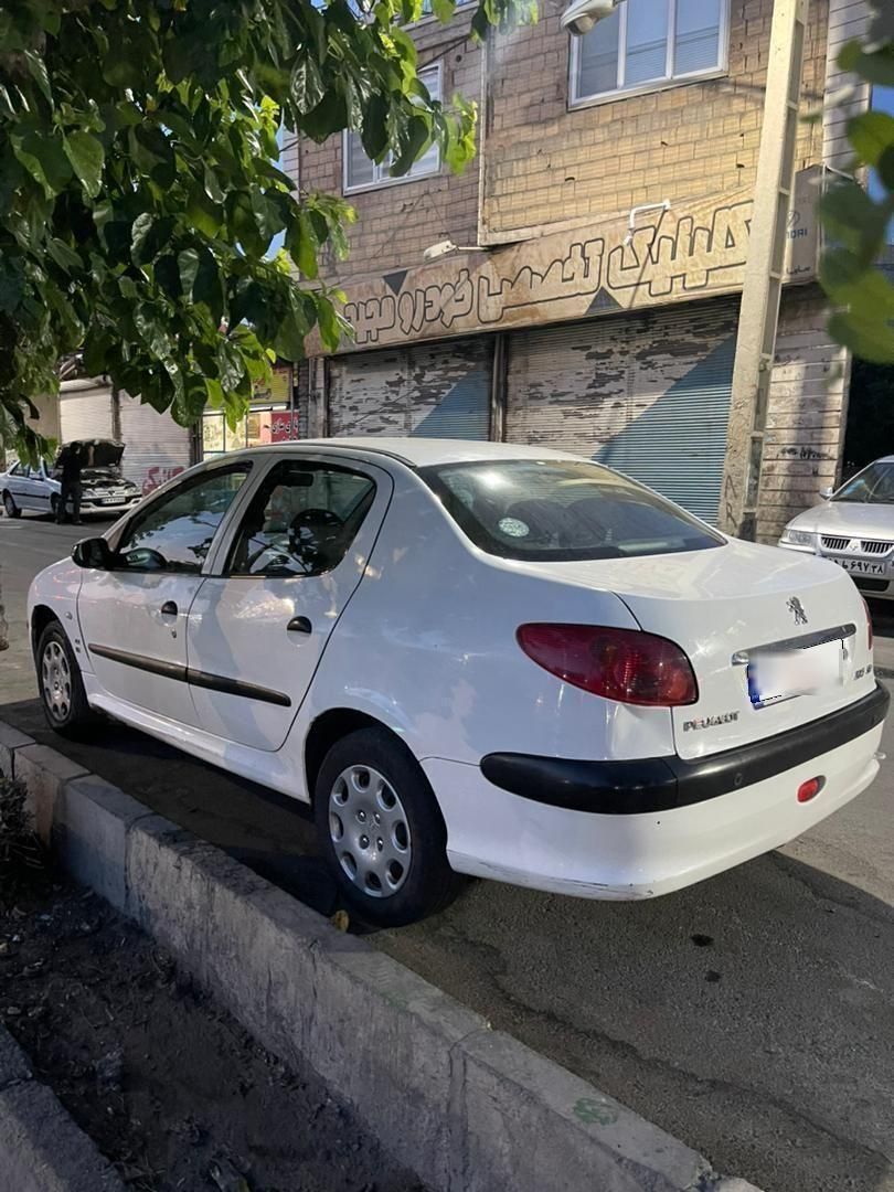 پژو ۲۰۶ صندوق دار v8 - 1396