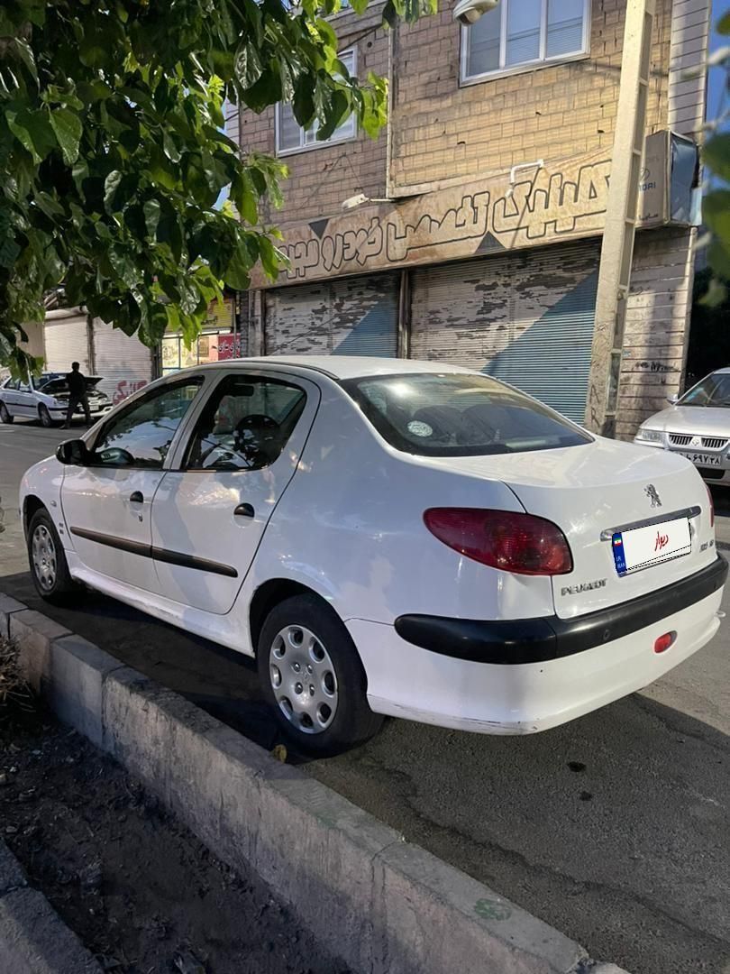 پژو ۲۰۶ صندوق دار v8 - 1396